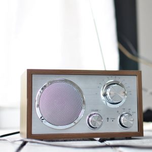 retro styled fm radio placed on desk